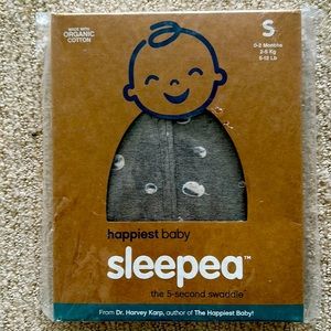 Brand new never opened happiest baby sweetpea swaddle size S.